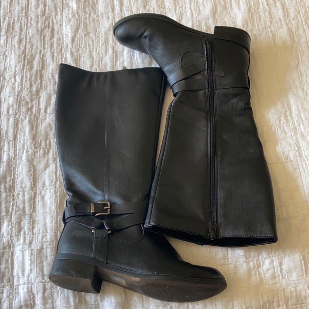 Tall black leather boots